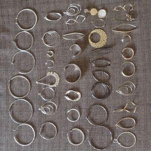 41 single earrings, gold, silver and black